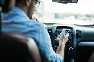 Man Texting While Driving